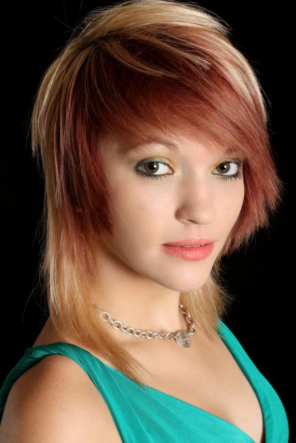 A beautiful young woman in a dress