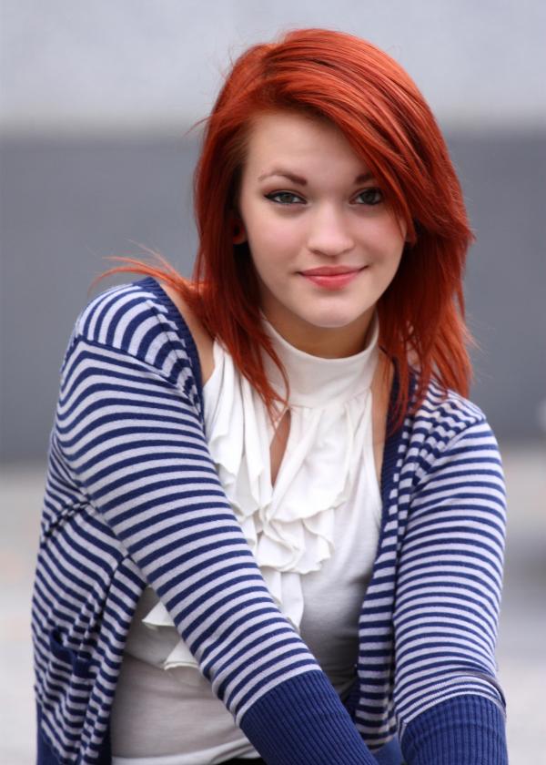 A beautiful young woman in business atti