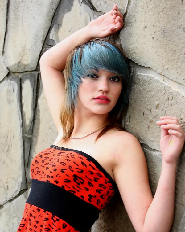 A beautiful young woman posing in red