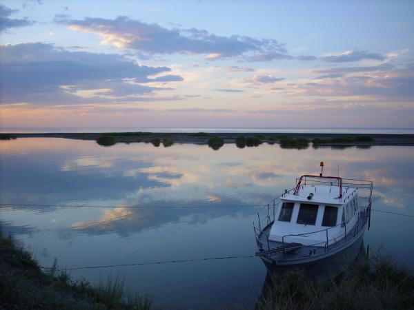 A boat on the surface of the water