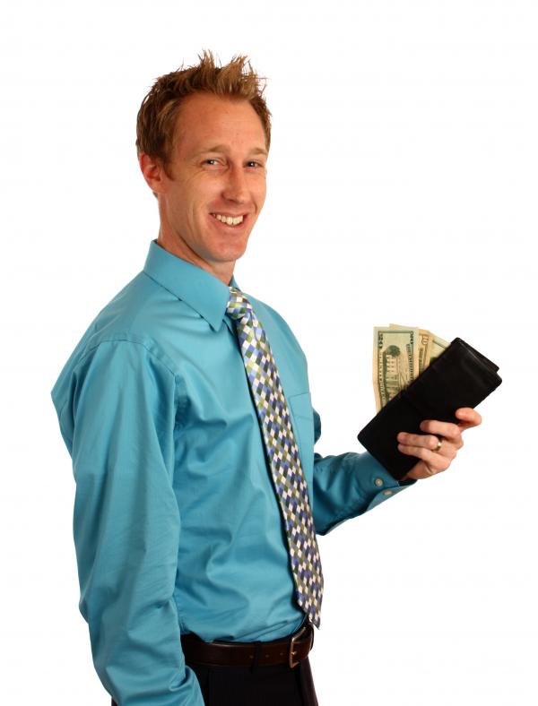 A businessman holding a wallet
