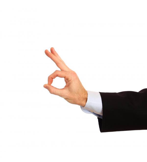 A hand making an ok gesture