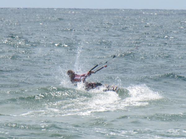 A kitesurfer at sea