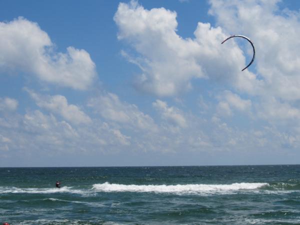 A kitesurfer at sea