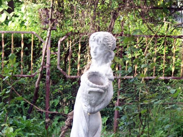 A statue in a garden