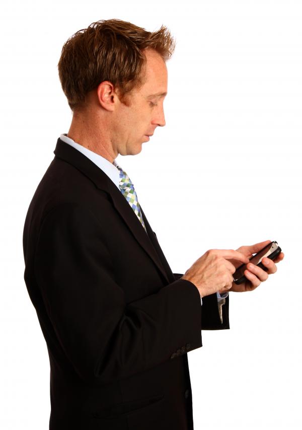 A young businessman using a smart phone