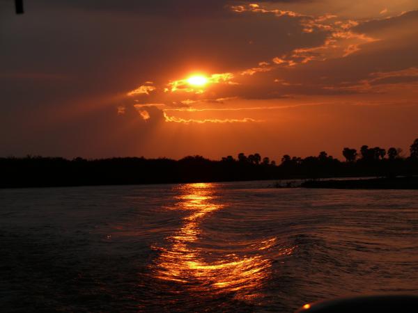 African sunset on river