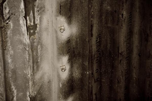 Aged metal surface