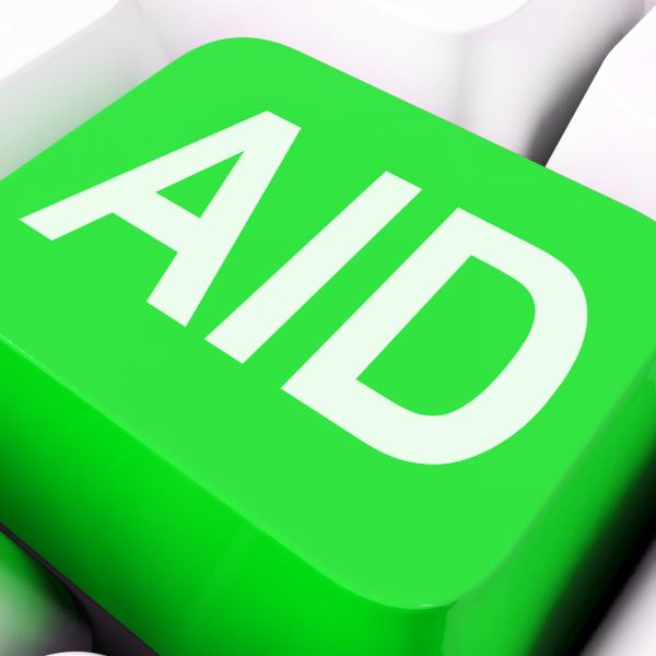 Aid Key Shows Help Assist Or Assistance