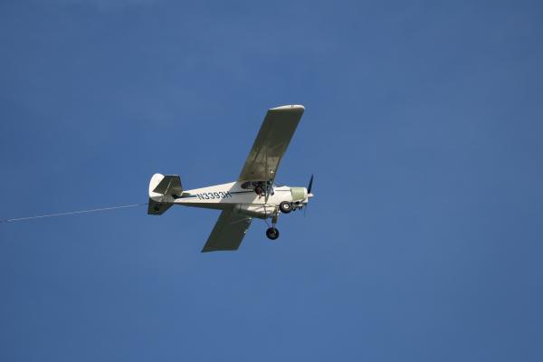 Airplane towing a sign