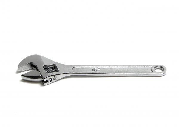 An adjustable wrench isolated on white