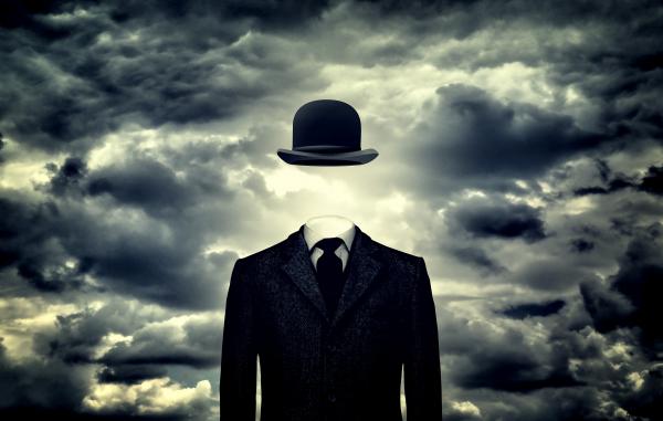 Anonymous businessman with derby hat