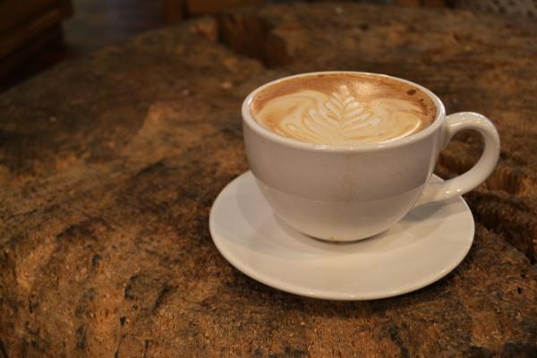 Art-coffee in a cup with a beautiful pattern on the surface
