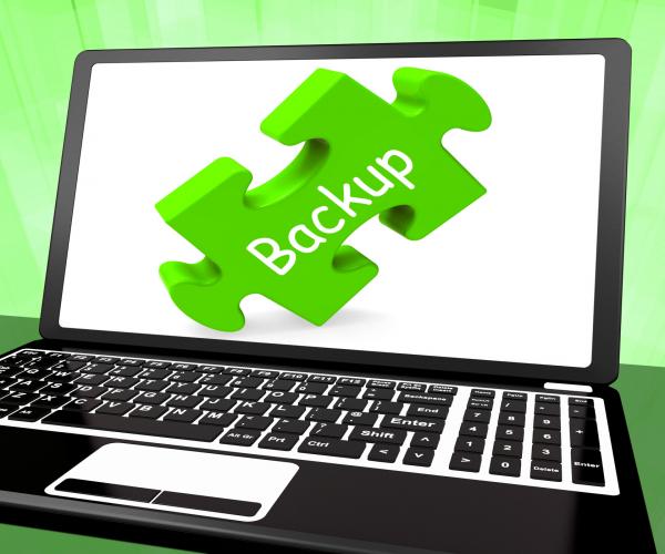 Backup Laptop Shows Data Archiving Back Up And Storage