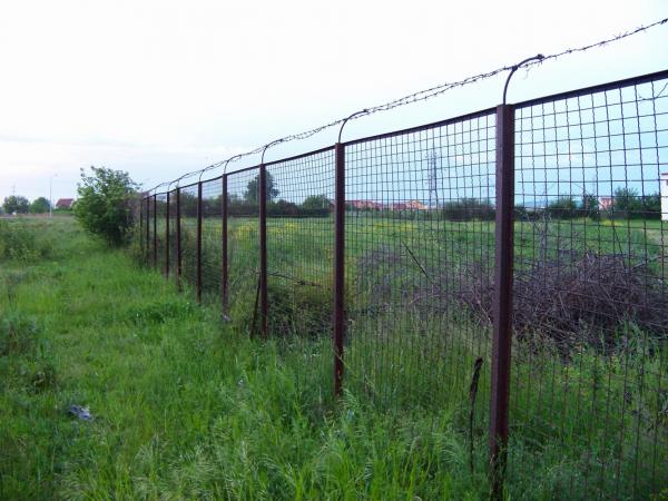 Barbed wire fence near a private propert