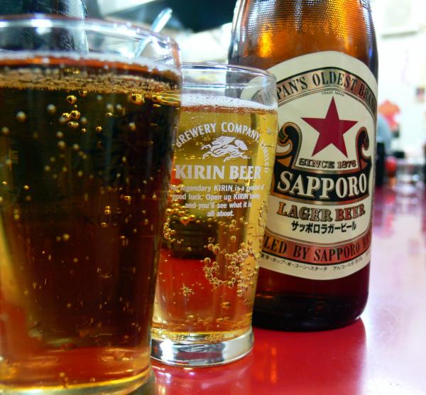 Beer bottle with matching mugs