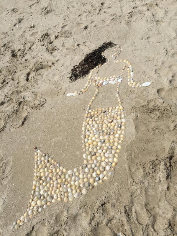 Beige Sea Clams Mermaid Figure on Seashore