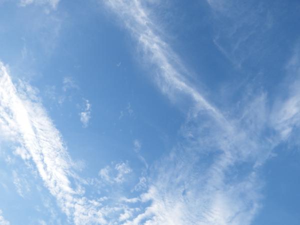 Blue Sky and Fluffy White Clouds