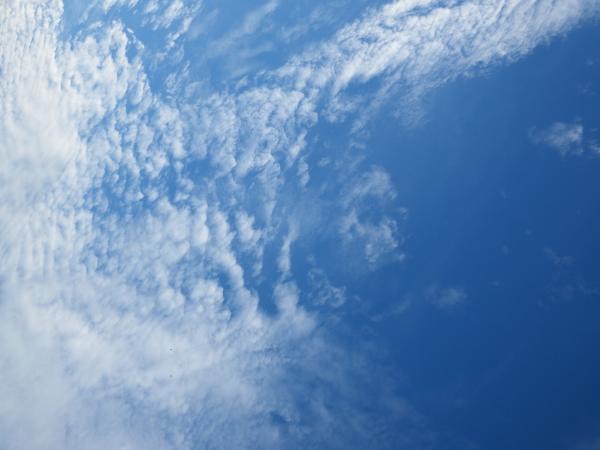 Blue Sky and Fluffy White Clouds