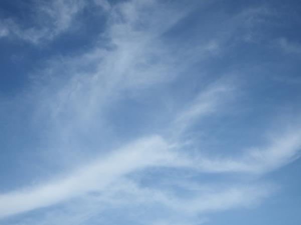 Blue Sky and Fluffy White Clouds