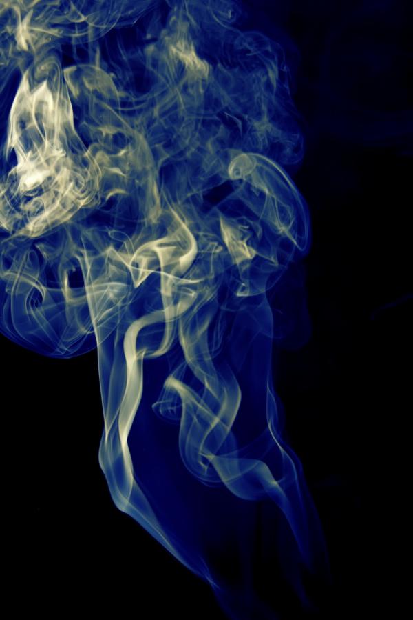 blue smoke on black