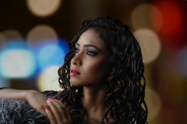 Bokeh Photography and Portrait of Curly-haired Woman