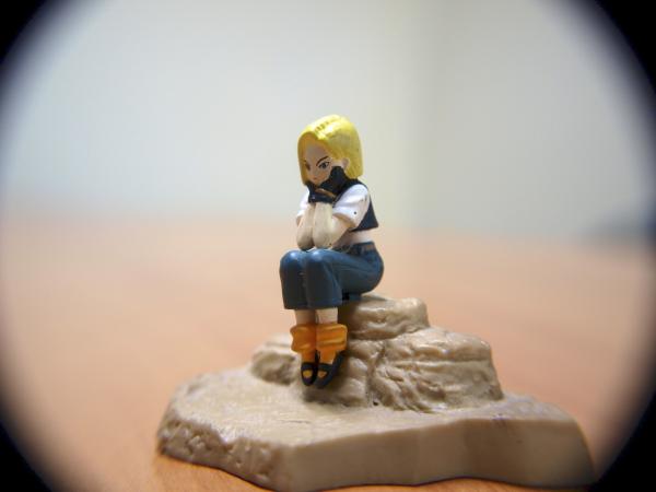 Bored girl, macro toy