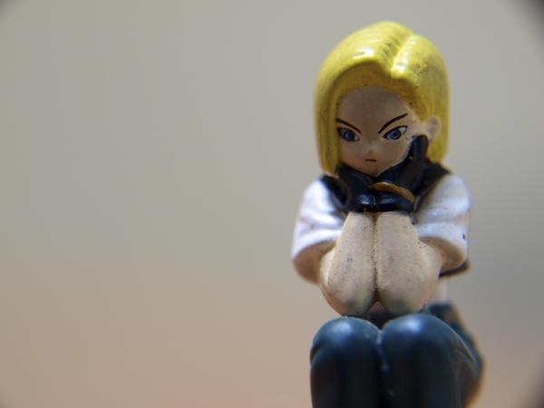 Bored girl, macro toy