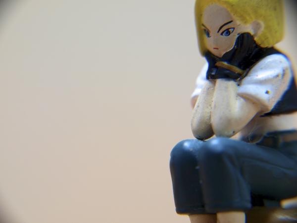 Bored girl, macro toy
