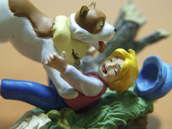 Boy and dog, macro toys