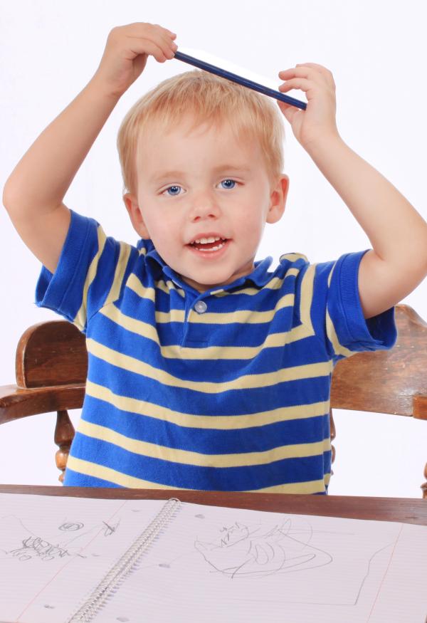 Boy bored with his homework