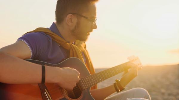 Boy playing guitar