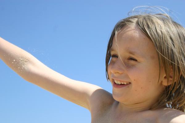 Boy smiling at center of the screen