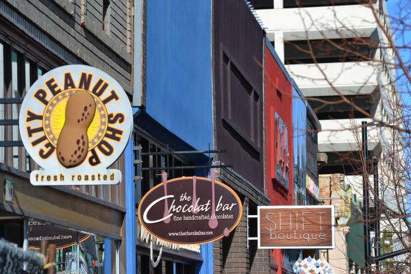 Bright signs of shops along the city street