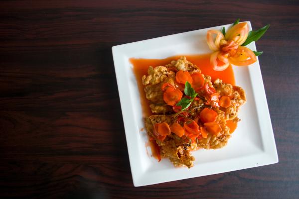 Brown Fried Food With Orange Soup on Ceramic Plate