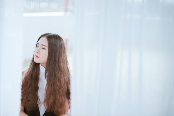 Brown Haired Woman in White and Black Shirt