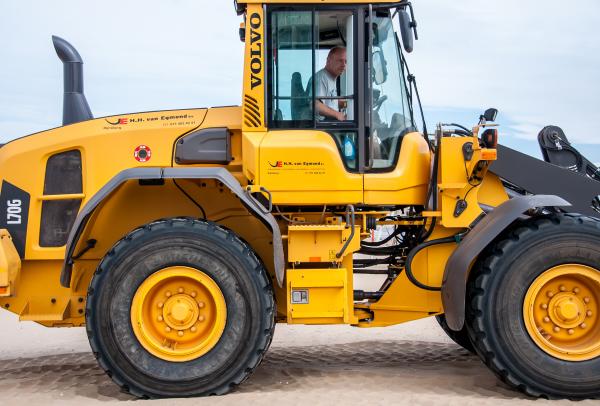 Bulldozer tractor working on a beach