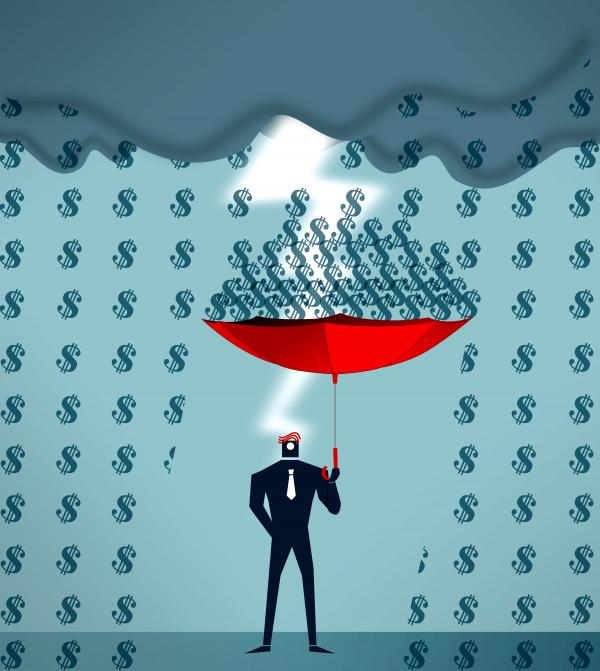 Businessman collecting raining dollars