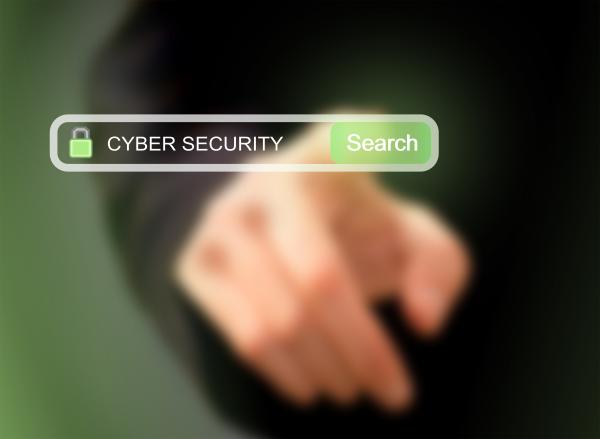 Businessman pressing cybersecurity