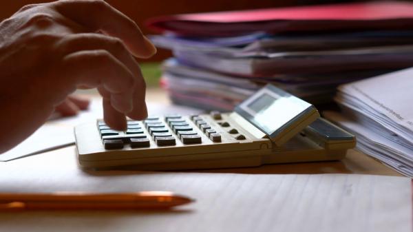 Calculator with Paperwork