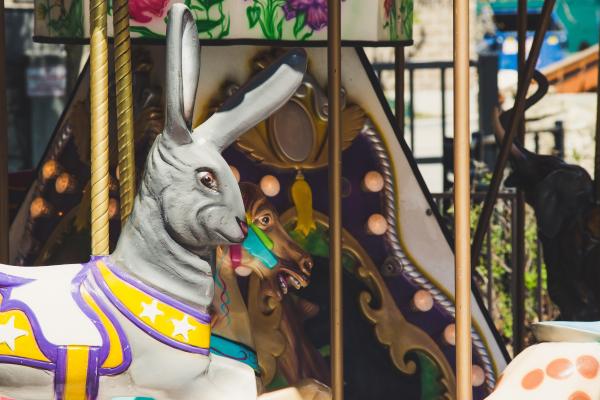 Carved rabbit carrusel in the theme park