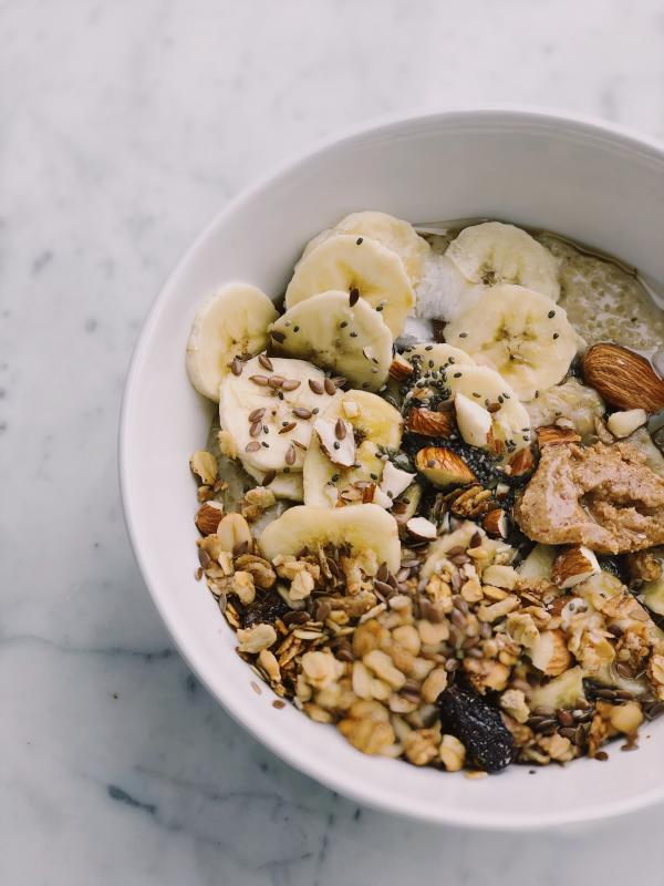 Cereal With Banana on White Bowl