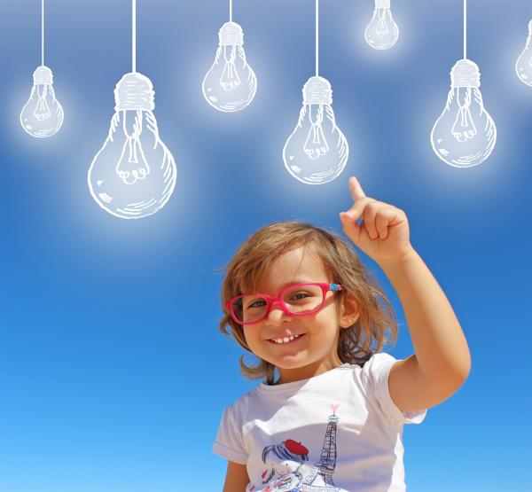 Cheerful Smiling Child Having Ideas - Creativity and Imagination