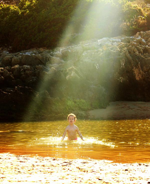 Child hit by sun rays bathing