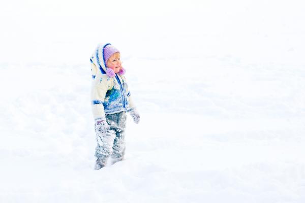 Child Playing in Winter