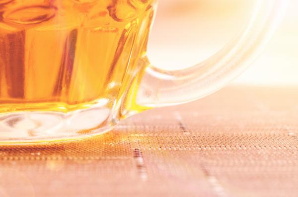 Closeup Photography of Clear Glass Beer Mug Filled With Yellow Liquid