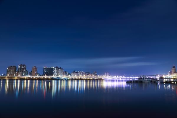 Colorful City Lights Reflected on Water