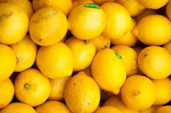 Colorful Display Of Lemons In Market