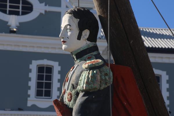 Colourful statue on the boat in the harbour