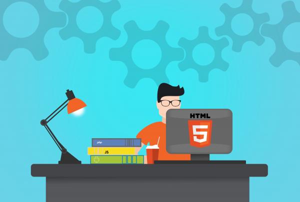 Computer programmer working at the desk